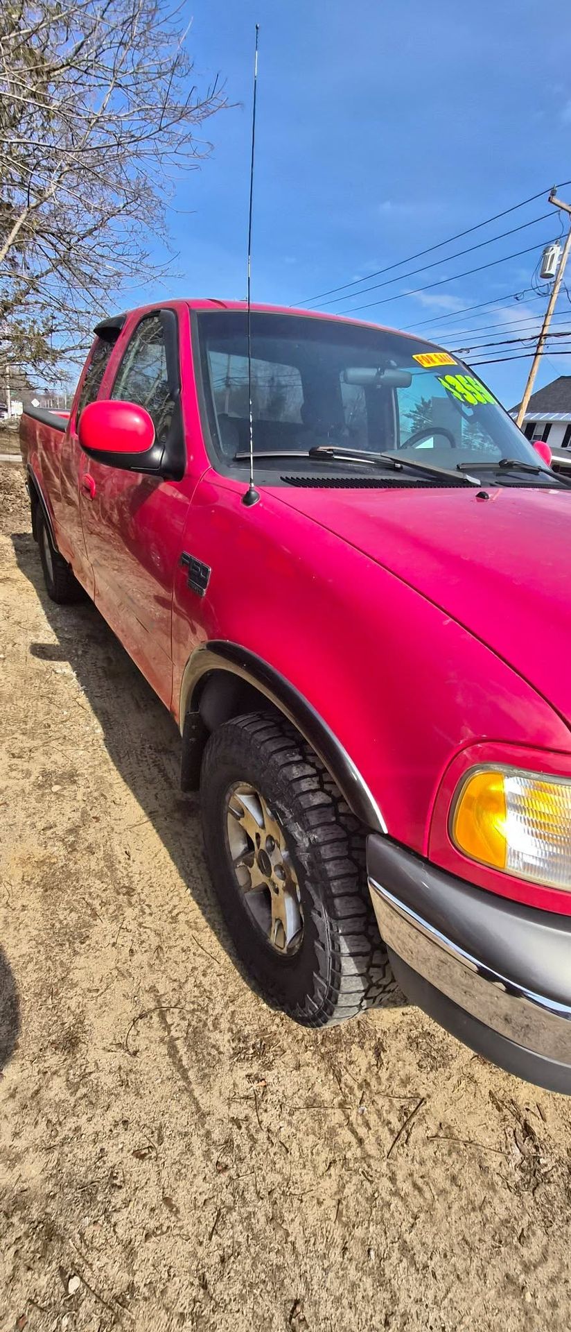 Red 2003 Ford F-150 pickup listed on Facebook Marketplace